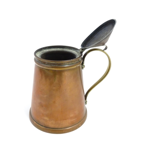 1000 - WAS Benson: An Arts & Crafts copper and brass insulated hot water jug. Marked under W. A. S. Benson.... 