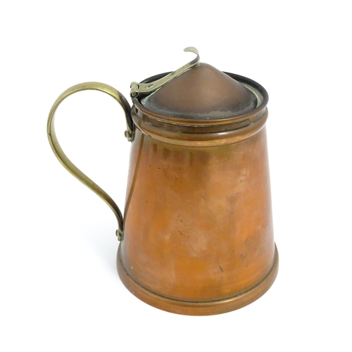 1000 - WAS Benson: An Arts & Crafts copper and brass insulated hot water jug. Marked under W. A. S. Benson.... 