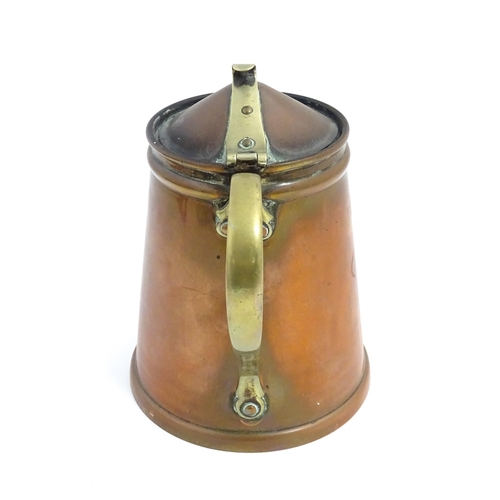 1000 - WAS Benson: An Arts & Crafts copper and brass insulated hot water jug. Marked under W. A. S. Benson.... 