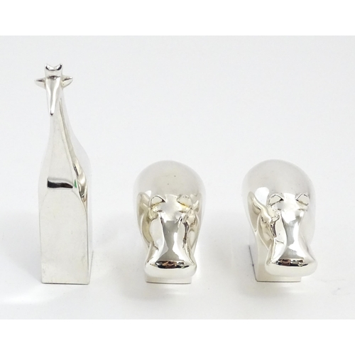 1005 - Three boxed Dansk silver plate novelty paperweights comprising giraffe, and two hippopotamus / hippo... 