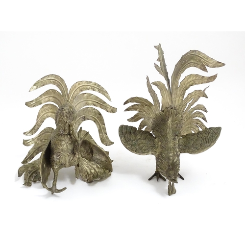 1021 - A pair of 20thC cast models of fighting cocks. Largest approx. 12 1/4