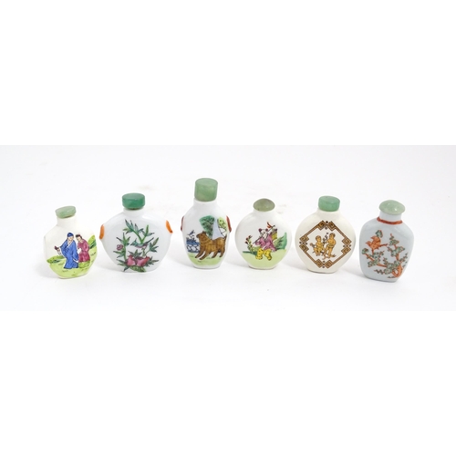 1030 - Six Chinese ceramic snuff bottles to include examples with hand painted decoration to include birds,... 