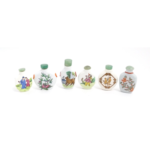 1030 - Six Chinese ceramic snuff bottles to include examples with hand painted decoration to include birds,... 