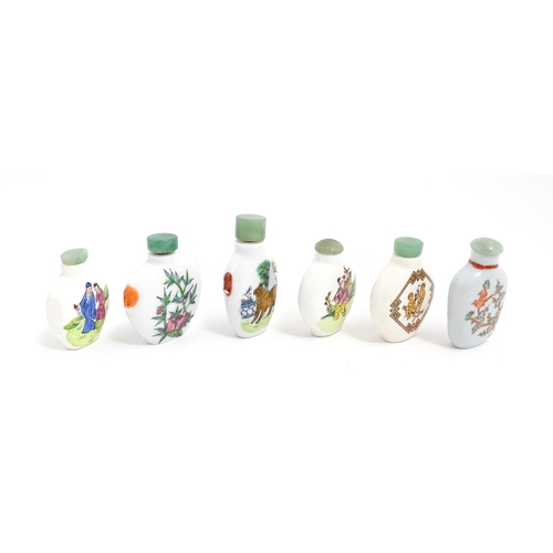 1030 - Six Chinese ceramic snuff bottles to include examples with hand painted decoration to include birds,... 