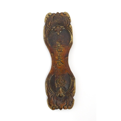 1033 - A quantity of Chinese silk winders to include a lacquered example with stylised bat and cloud detail... 