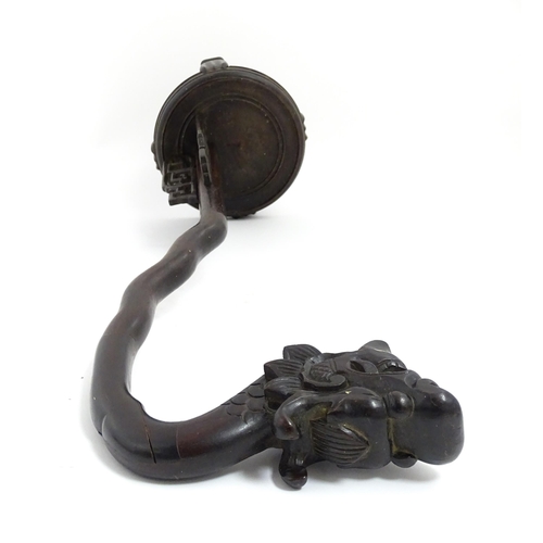 1047 - A Chinese carved hardwood lantern / lamp stand with dragon head and fretwork detail. Approx. 27 3/4