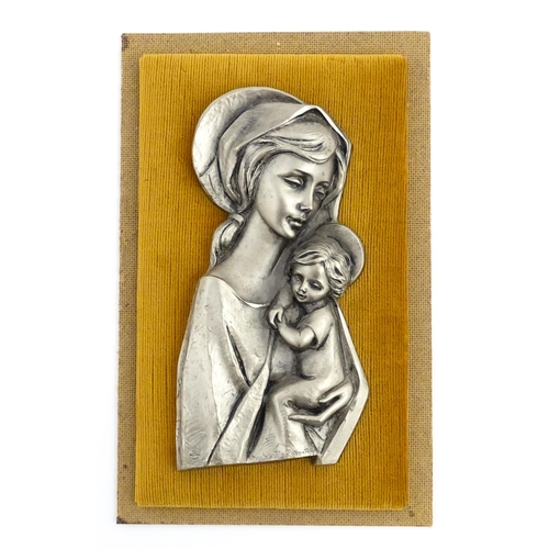 1058 - A 20thC Continental cast relief depicting Madonna and Child. Bears cast signature lower. Approx. 10