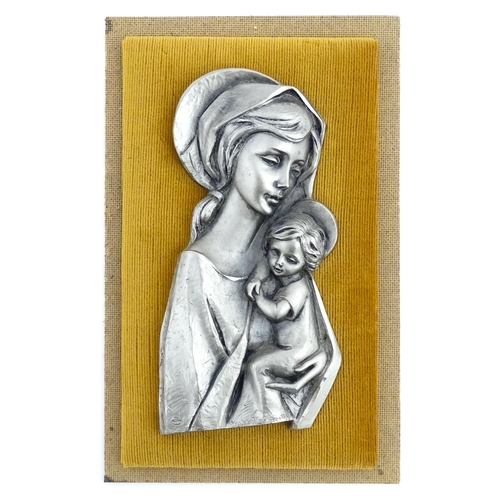 1058 - A 20thC Continental cast relief depicting Madonna and Child. Bears cast signature lower. Approx. 10