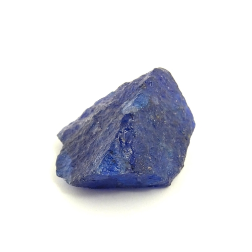 1067 - Natural History / Geology Interest: A raw / rough uncut natural sapphire. With identification report... 