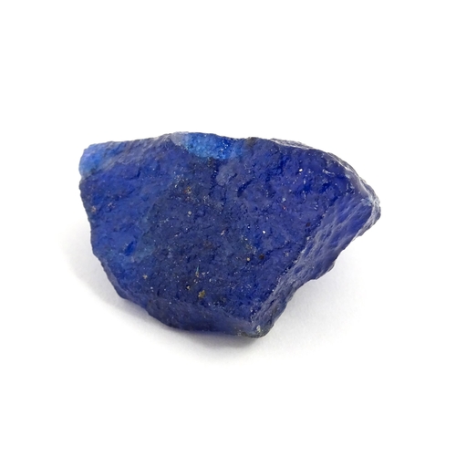 1067 - Natural History / Geology Interest: A raw / rough uncut natural sapphire. With identification report... 