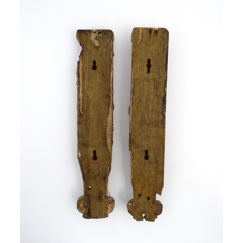 1076 - Two 18th / 19thC carved wooden caryatid brackets each depicting an ecclesiastical female figure, wit... 