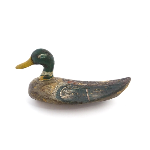 1077 - An early 20thC hand carved and painted wooden duck decoy in the form of a drake Mallard , approx 14