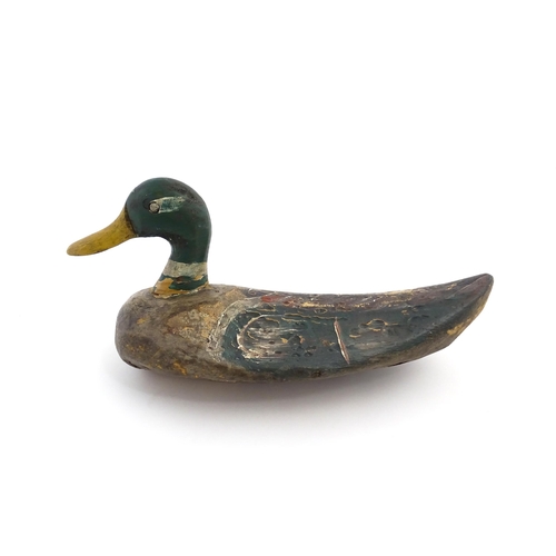 1077 - An early 20thC hand carved and painted wooden duck decoy in the form of a drake Mallard , approx 14