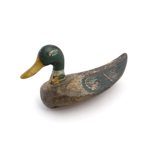 1077 - An early 20thC hand carved and painted wooden duck decoy in the form of a drake Mallard , approx 14