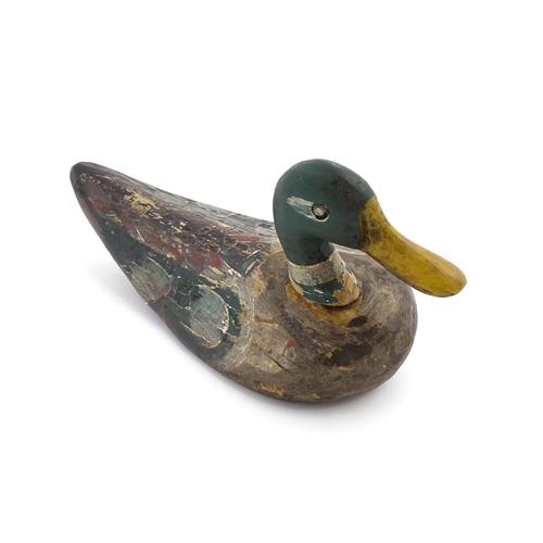 1077 - An early 20thC hand carved and painted wooden duck decoy in the form of a drake Mallard , approx 14