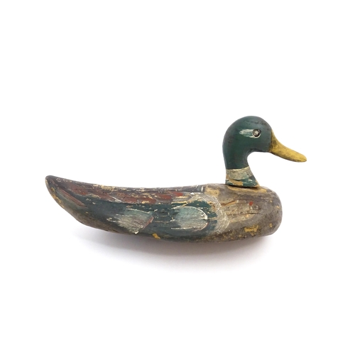 1077 - An early 20thC hand carved and painted wooden duck decoy in the form of a drake Mallard , approx 14