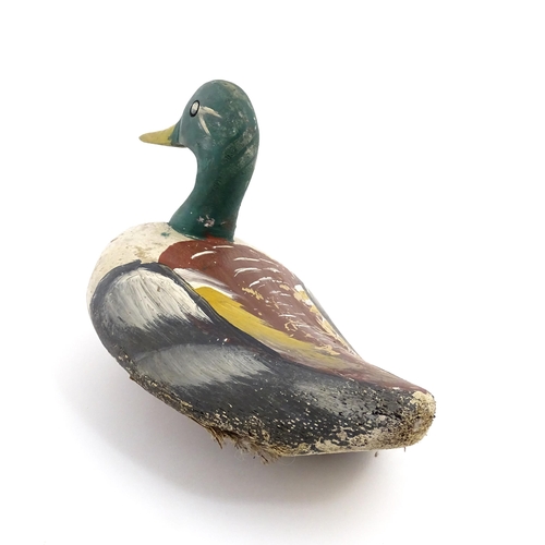 1078 - An early 20thC hand carved and painted wooden duck decoy in the form of a drake Mallard, approx 12