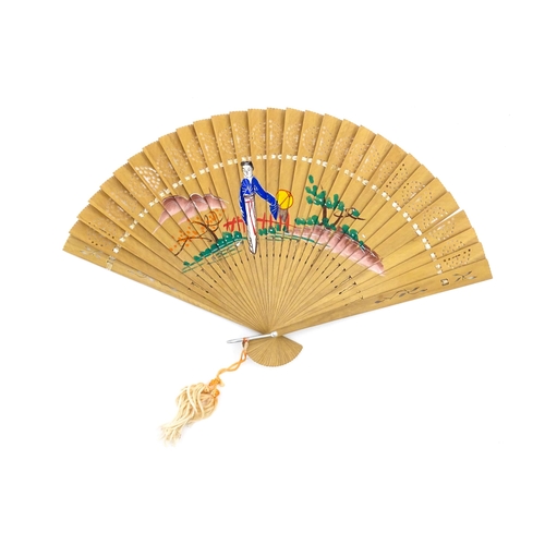 1079 - Three assorted 20thC wooden fans to include a 32 stick example with pierced decoration and hand pain... 