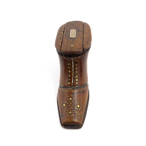 1141 - Treen : A 19thC shoe snuff box with sliding lid and inlaid brass studwork decoration. Approx. 3 3/4