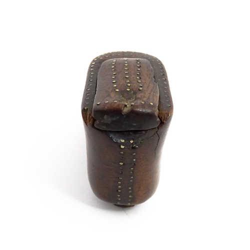 1144 - Treen : A 19thC shoe snuff box of boot form with sliding lid and inlaid brass studwork decoration. A... 