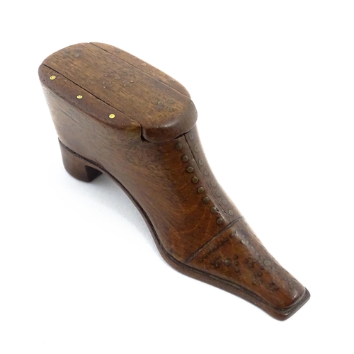 1145 - Treen : A 19thC shoe snuff box with sliding lid and inlaid brass studwork decoration. Approx. 4