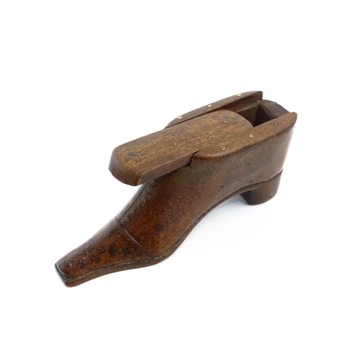 1145 - Treen : A 19thC shoe snuff box with sliding lid and inlaid brass studwork decoration. Approx. 4