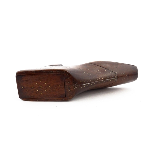 1150 - Treen : A large 19thC shoe snuff box / table snuff with sliding lid and inlaid brass studwork decora... 