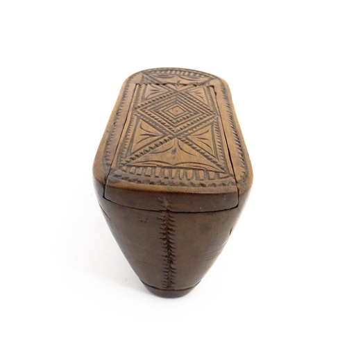 1153 - Treen : A 19thC Continental shoe table snuff box with chip carved decoration to the sliding top. App... 