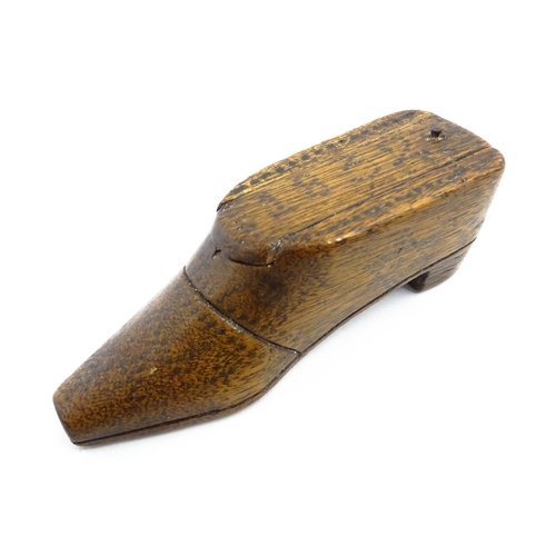 1154 - Treen : An early 19thC shoe snuff box with sliding lid and inlaid brass studwork decoration, dated 1... 