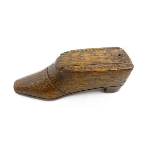 1154 - Treen : An early 19thC shoe snuff box with sliding lid and inlaid brass studwork decoration, dated 1... 