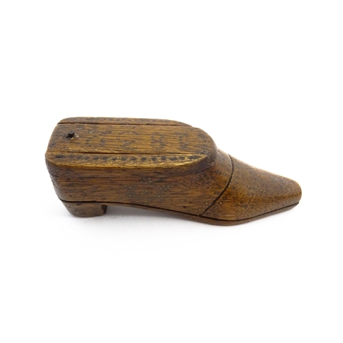 1154 - Treen : An early 19thC shoe snuff box with sliding lid and inlaid brass studwork decoration, dated 1... 