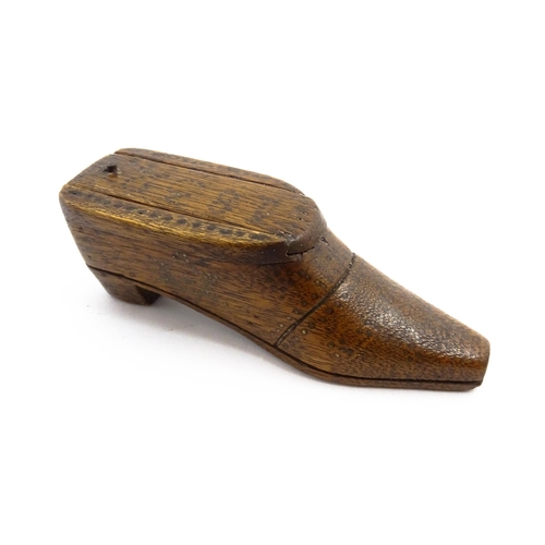 1154 - Treen : An early 19thC shoe snuff box with sliding lid and inlaid brass studwork decoration, dated 1... 