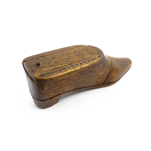 1154 - Treen : An early 19thC shoe snuff box with sliding lid and inlaid brass studwork decoration, dated 1... 