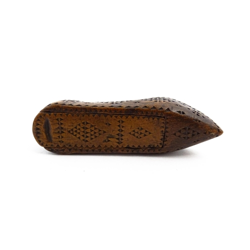 1155 - Treen : A 19thC Continental shoe snuff box with sliding lid and chip carved decoration. Approx. 3 1/... 