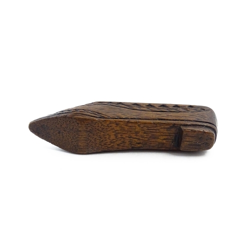 1156 - Treen : A 19thC Continental shoe snuff box with sliding lid and chip carved decoration. Approx. 4 3/... 