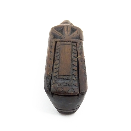 1156 - Treen : A 19thC Continental shoe snuff box with sliding lid and chip carved decoration. Approx. 4 3/... 