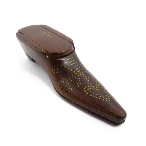 1157 - Treen : A 19thC shoe snuff box with sliding lid and inlaid brass heart studwork decoration. Approx. ... 