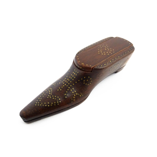 1157 - Treen : A 19thC shoe snuff box with sliding lid and inlaid brass heart studwork decoration. Approx. ... 