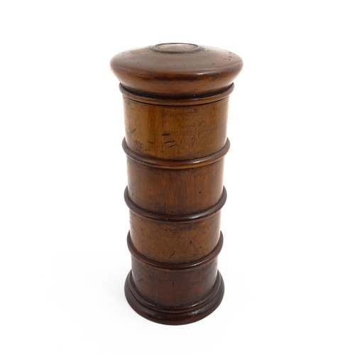 1163 - A four tier treen spice tower labelled Cloves, Nutmeg, Mace, and Ginger. Approx. 7 1/2