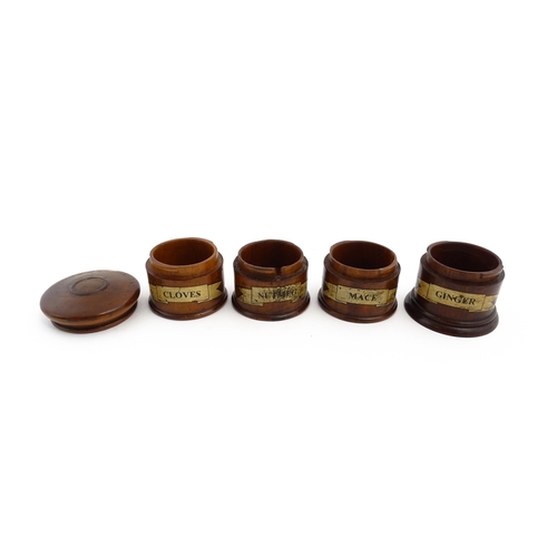 1163 - A four tier treen spice tower labelled Cloves, Nutmeg, Mace, and Ginger. Approx. 7 1/2