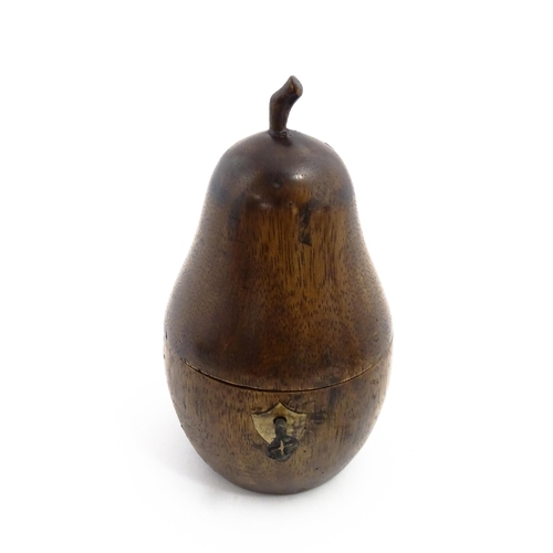 1165 - Treen : A fruitwood caddy formed as a pear. Approx. 7