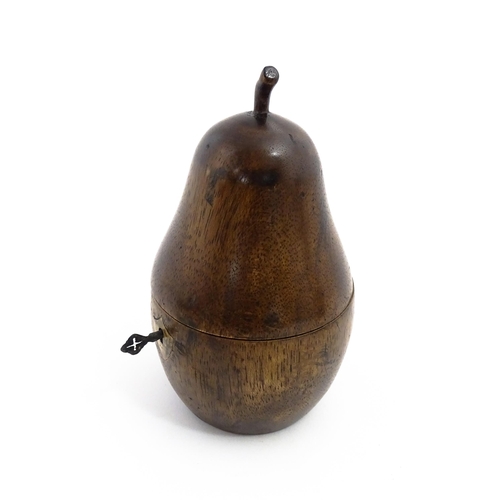 1165 - Treen : A fruitwood caddy formed as a pear. Approx. 7