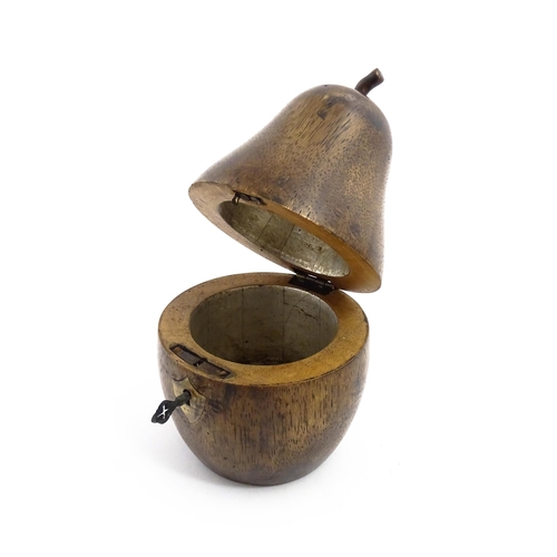 1165 - Treen : A fruitwood caddy formed as a pear. Approx. 7