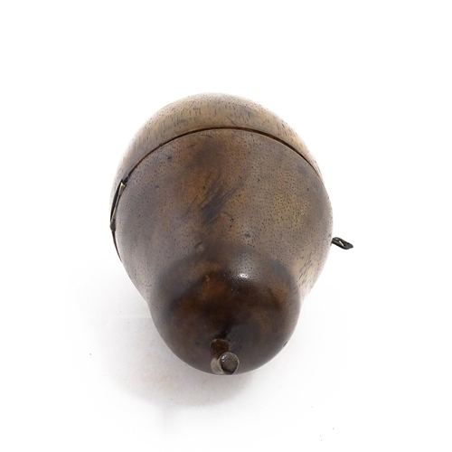 1165 - Treen : A fruitwood caddy formed as a pear. Approx. 7