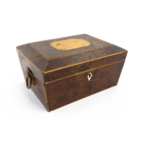 1171 - A 19thC burr yew workbox of tapering form with twin handles, and parquetry inlay to top. Opening to ... 