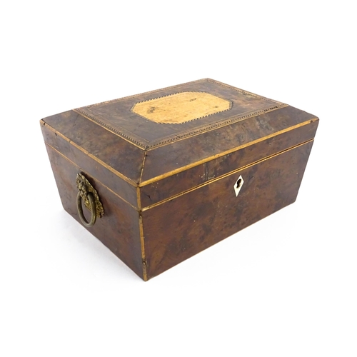 1171 - A 19thC burr yew workbox of tapering form with twin handles, and parquetry inlay to top. Opening to ... 