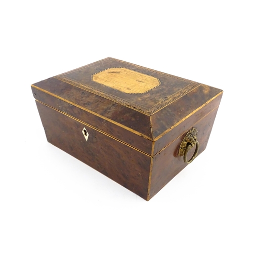 1171 - A 19thC burr yew workbox of tapering form with twin handles, and parquetry inlay to top. Opening to ... 