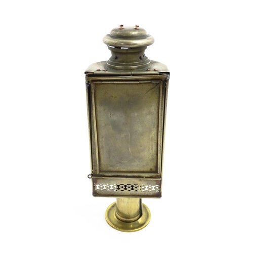 1181 - A 19thC lantern / hand lamp, the interior with spring-loaded candle, approx 8