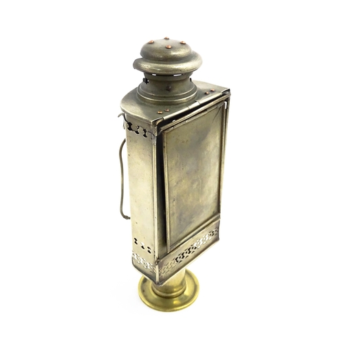 1181 - A 19thC lantern / hand lamp, the interior with spring-loaded candle, approx 8