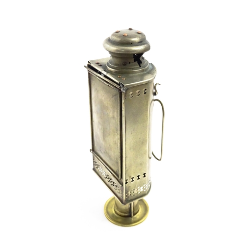 1181 - A 19thC lantern / hand lamp, the interior with spring-loaded candle, approx 8